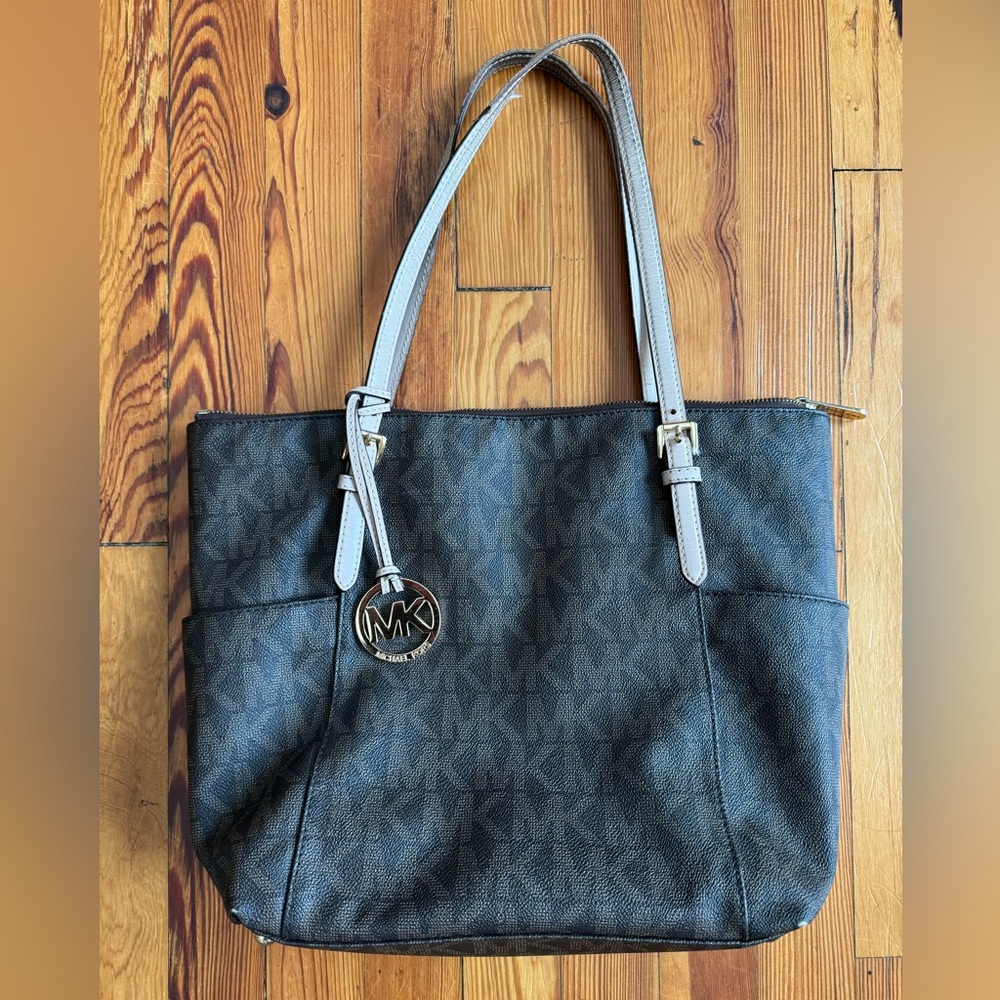 Michael Kors bag, in ok shape, cooor brown with MK logo all over